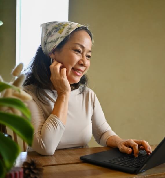 beautiful-middle-age-woman-having-video-call-with-2024-12-02-19-51-12-utc (1)