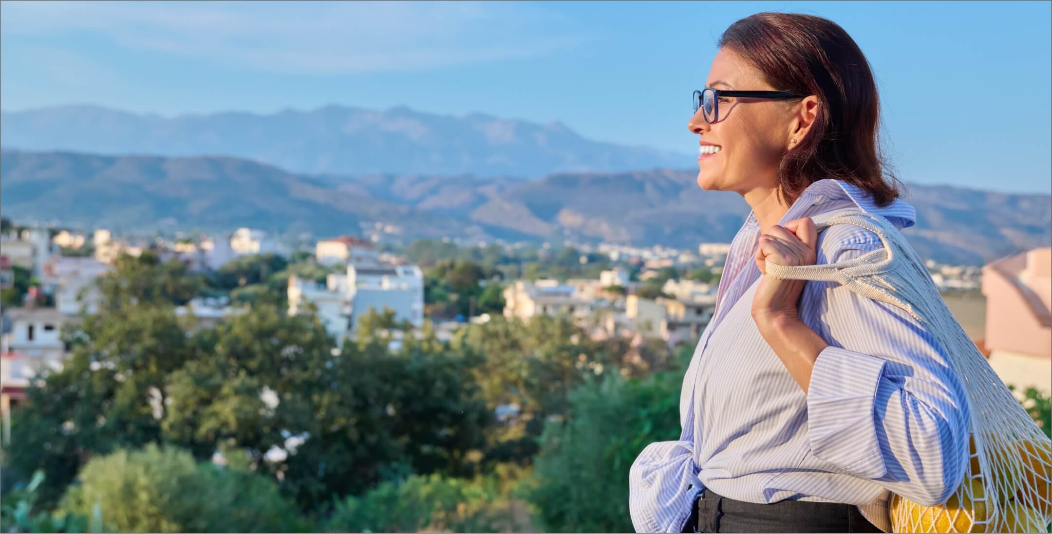 happy-calm-woman-enjoying-vacation-in-nature-prof-2024-12-08-04-43-31-utc (1)